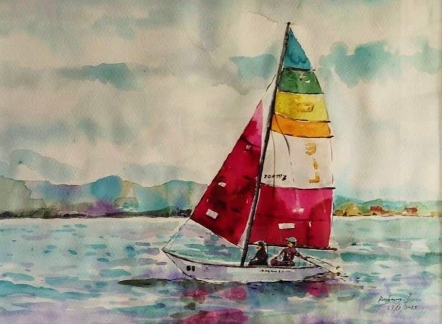 A Journey of Colors Bunleang Dumthongsuk A watercolour of a small sailboat with multicoloured sails gliding across turquoise water, with distant hills and an open sky behind.